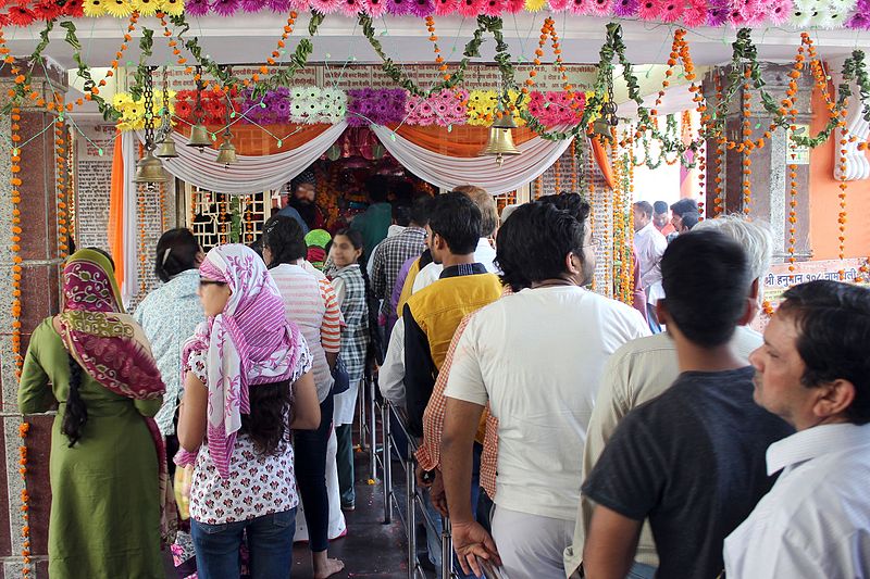 Devotees worshipping Lord Hanuman on Hanuman Jayanti