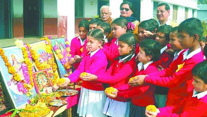 Children paying tribute to the goddess on Basant Panchami.