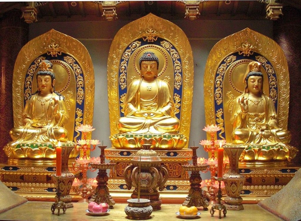 Three golden idols of Lord Buddha