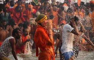 Hindus bathing in the sacred river on Kumbh Mela