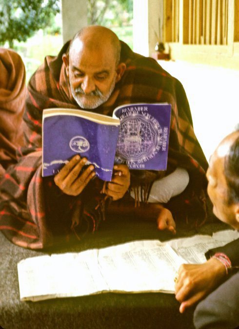 Baba Reading The Book 'Be Here Now' Written By His Disciple Ram Dass