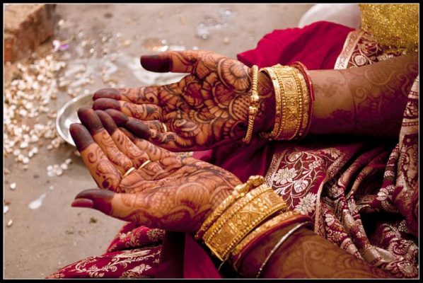 Bride's Hands Decorated with Henna